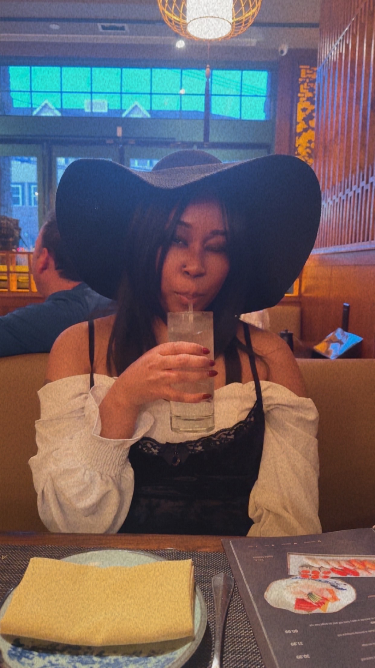 Venessa Odigie wearing a hat outdoors